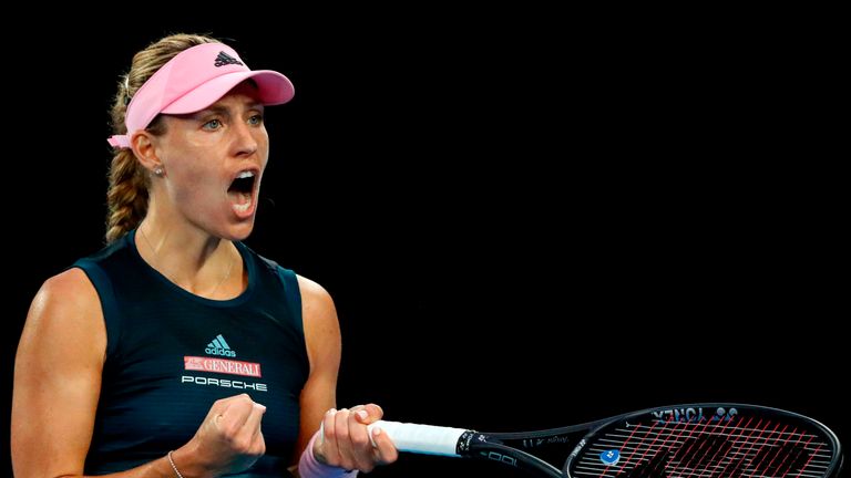 Germany's Angelique Kerber celebrates after victory against Brazil's Beatriz Haddad Maia during their women's singles match on day three of the Australian Open tennis tournament in Melbourne on January 16, 2019. 