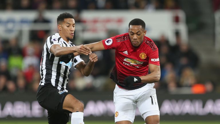 Manchester United's Anthony Martial in action with Isaac Hayden of Newcastle United 