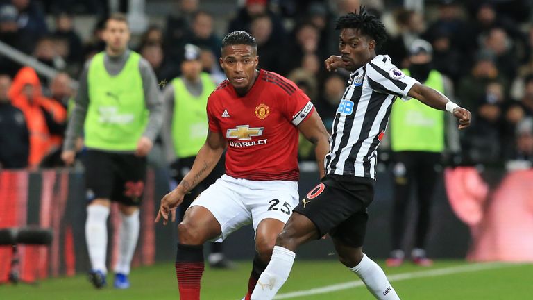  Antonio Valencia and Christian Atsu in action at St James' Park