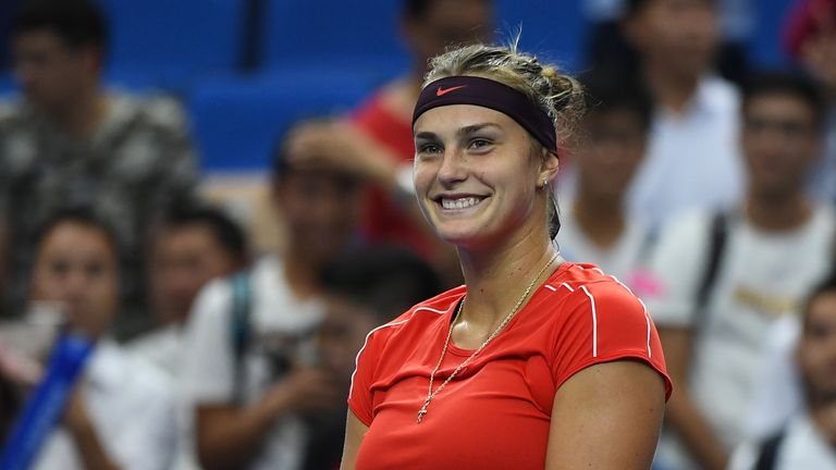 Aryna Sabalenka of Belarus celebrates after defeating Ashleigh Barty of Australia during the women's singles 1st Round match of the 2018 WTA Elite Trophy Zhuhai at Hengqin Tennis Center on October 30, 2018 in Zhuhai, China