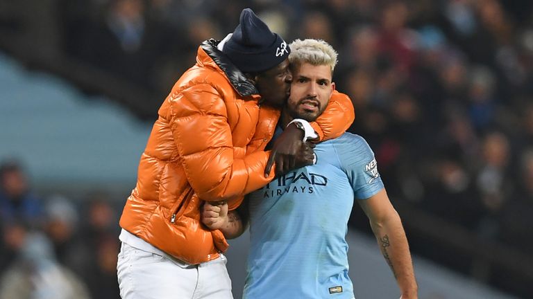 Benjamin Mendy plants a kiss on the cheek of Manchester City team-mate Sergio Aguero at full-time