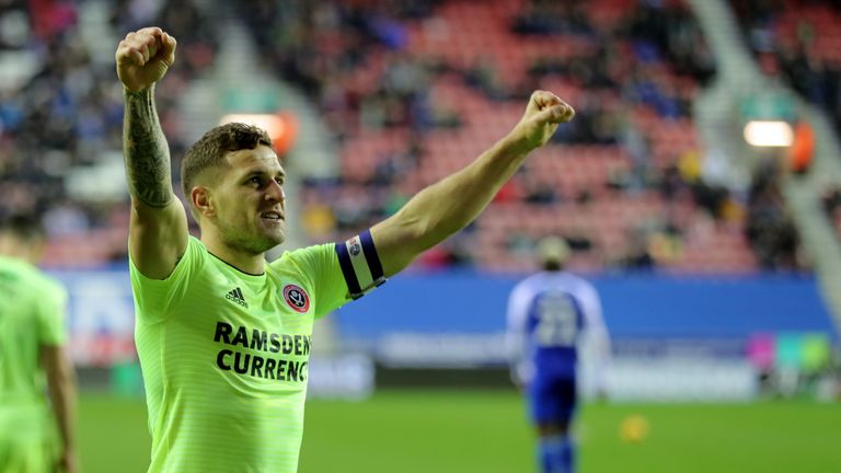 Billy Sharp celebrates his landmark goal at Wigan