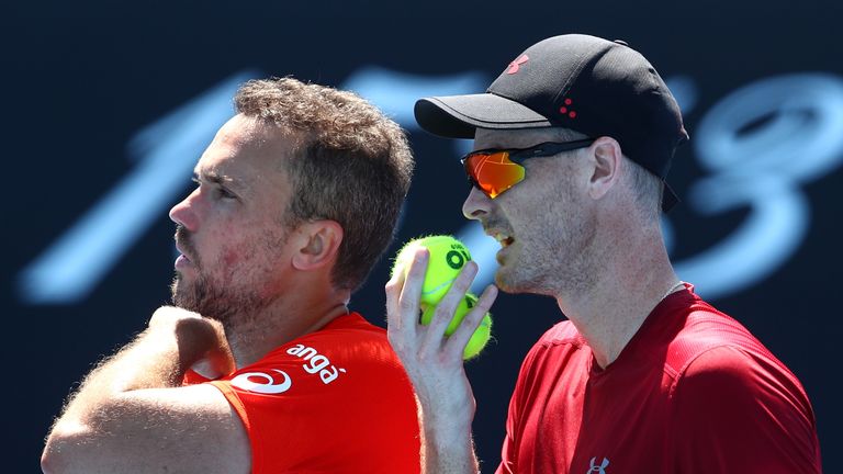 Bruno Soares of Brazil and Jamie Murray of Great Britain talk tactics in their Men's Double match against Kevin Krawietz of Germany and Nikola Mektic of Croatia during day eight of the 2019 Australian Open at Melbourne Park on January 21, 2019 in Melbourne, Australia
