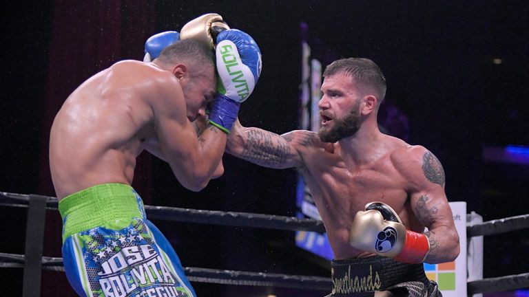 Caleb Plant in black trunks lands a punch against Jose Uzcategui in the sixth round during the IBF Super Middleweight Championship 12 round match at Microsoft Theater on January 13, 2019 in Los Angeles, California. Plant won by unanimous decision