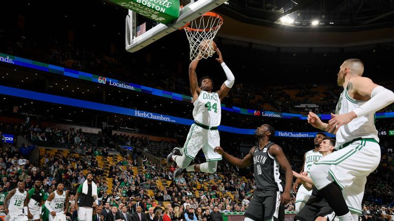 Robert Williams of the Boston Celtics dunks the ball against the Brooklyn Nets