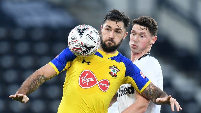 Charlie Austin and George Evans during the FA Cup Third Round match between Derby County and Southampton at Pride Park on January 5, 2019 in Derby, United Kingdom.