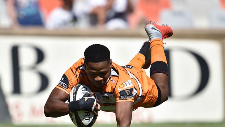 Malcolm Jaer dives over for a try in the Cheetahs' comprehensive win