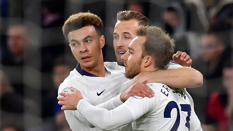 Christian Eriksen celebrates his goal with Dele Alli and Harry Kane