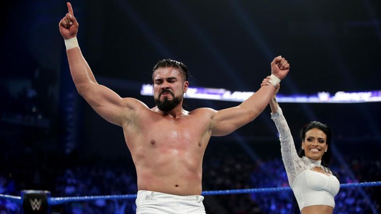 Andrade "Cien" Almas celebrates with Zelina Vega after defeating Rey Mysterio & Mustafa Ali on SmackDown.