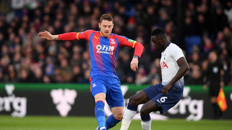 Connor Wickham of Crystal Palace battles for possession with Davinson Sanchez of Tottenham 