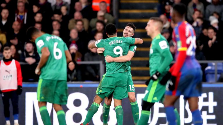 Craig Cathcart celebrates his goal with team-mate Troy Deeney