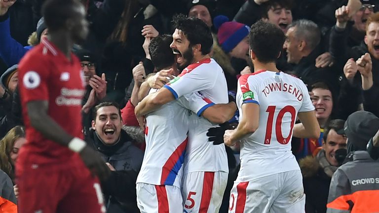 Crystal Palace's James Tomkins celebrates with team-mates after scoring their second goal