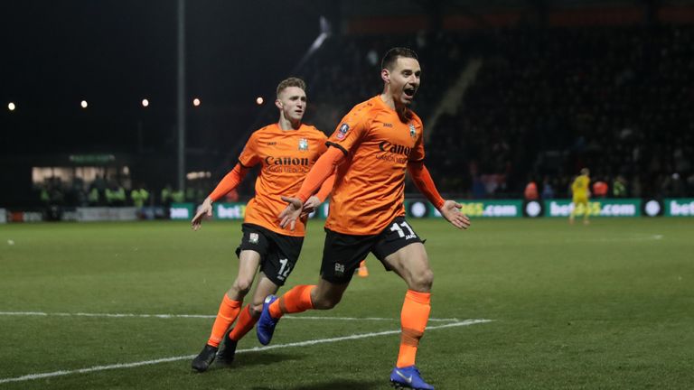 Barnet's Dan Sparkes (right) celebrates scoring his side's third goal of the game with a sublime free-kick