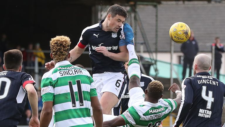 Moussa Dembele of Celtic vies with Darren O'Dea of Dundee during the Ladbrokes Scottish Premiership match between Dundee and Celtic at Dens Park Stadium on March 19, 2017 in Dundee, Scotland. 