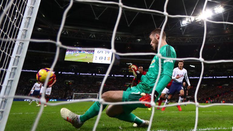 LONDON, ENGLAND - JANUARY 13:  David De Gea of Manchester United makes a save during the Premier League match between Tottenham Hotspur and Manchester United at Wembley Stadium on January 13, 2019 in London, United Kingdom.  (Photo by Clive Rose/Getty Images)