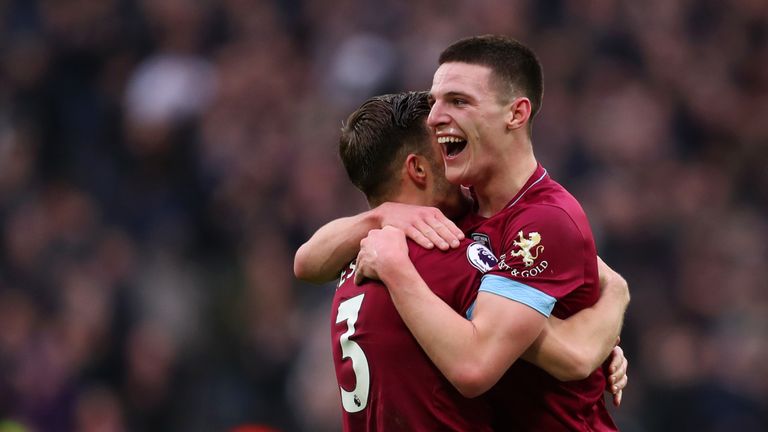 Declan Rice and Aaron Cresswell celebrate the 1-0 over Arsenal