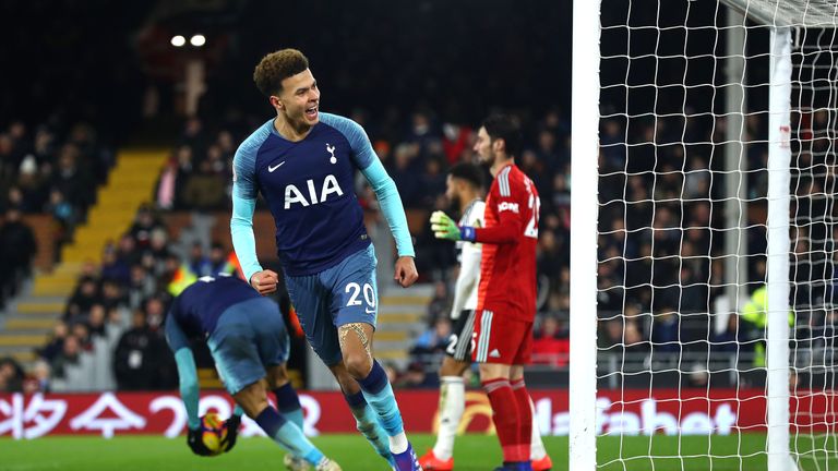 Dele Alli of Tottenham celebrates after he scores his sides first goal during the Premier League match between Fulham FC and Tottenham Hotspur at Craven Cottage on January 20, 2019 in London, United Kingdom.