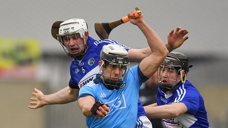 Caught in a tangle: Cian Boland of Dublin evades Ryan Mullaney and Colm Stapleton of Laois