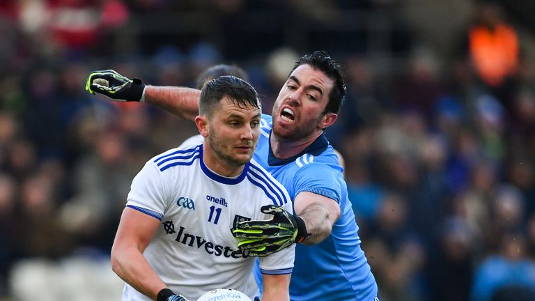 Dermot Malone of Monaghan in action against Michael Darragh Macauley of Dublin