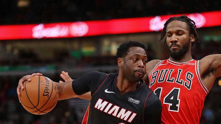 Dwyane Wade #3 of the Miami Heat moves past Wayne Selden #14 of the Chicago Bulls at United Center on January 19, 2019 in Chicago, Illinois.