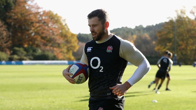 Elliot Daly runs with the ball during the England training session held at Pennyhill Park on November 14, 2018 in Bagshot, England