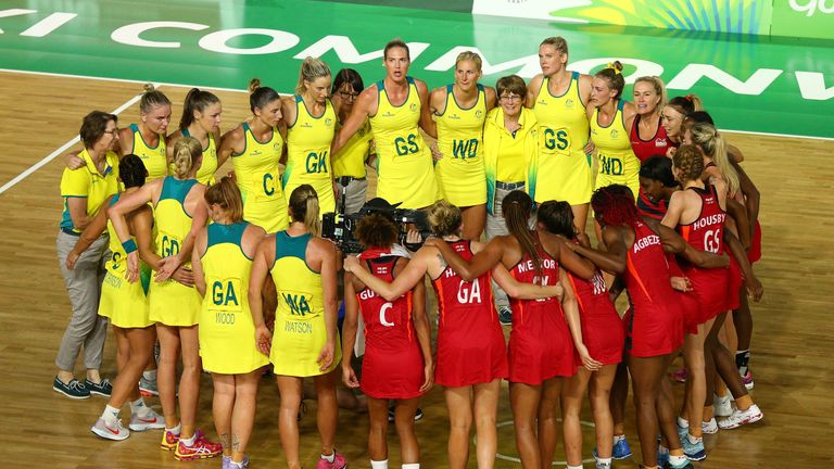 Australia and England huddled together after the full-time whistle of the Commonwealth Games' final im 2018