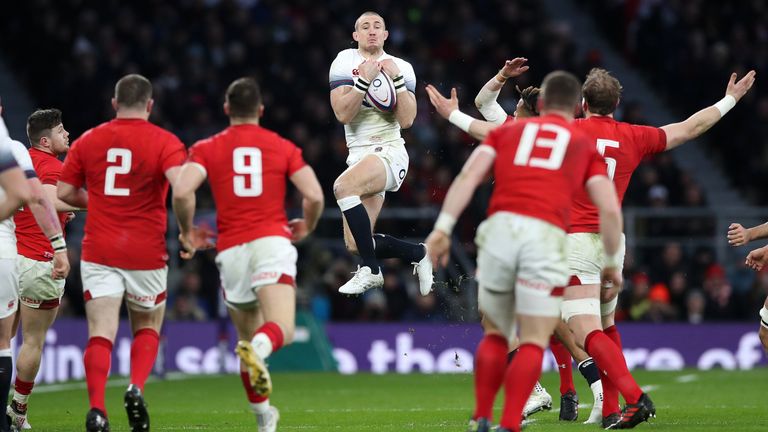 Englad's Mike Brown claims a high ball during his side's Six Nations clash with Wales in 2018