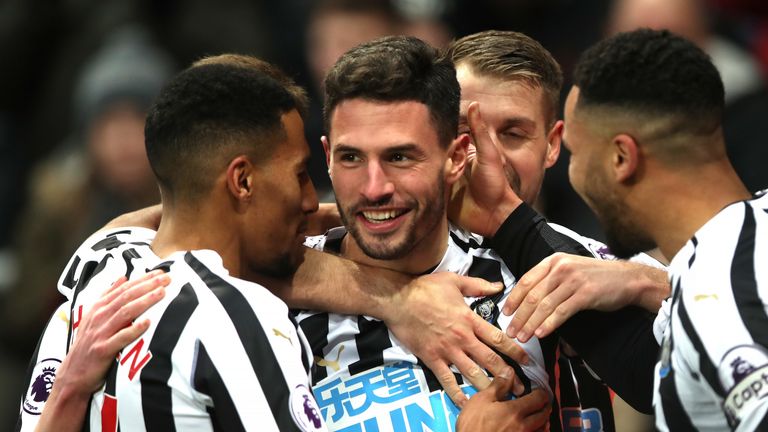 Fabian Schar of Newcastle United celebrates with team-mates after scoring his sides second goal