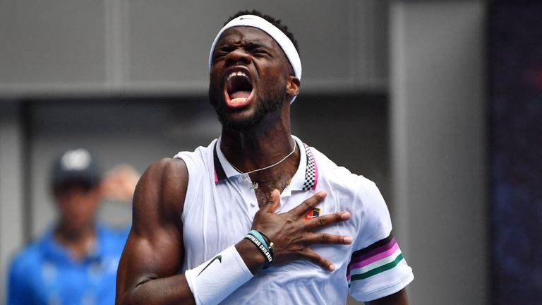 Frances Tiafoe of the US celebrates his victory against South Africa's Kevin Anderson during their men's singles match on day three of the Australian Open tennis tournament in Melbourne on January 16, 2019