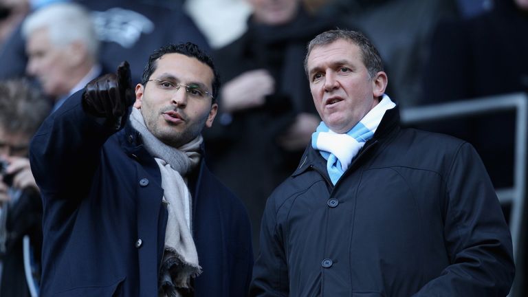 Cook alongside City chairman Khaldoon Al Mubarak