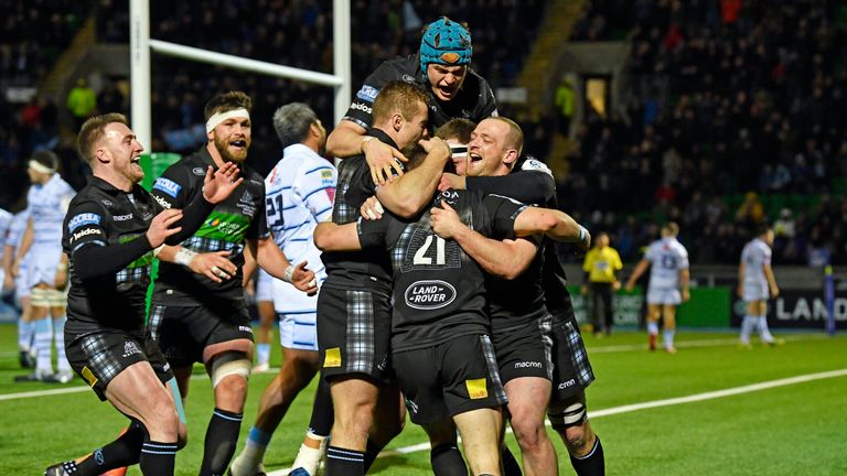 Glasgow Warriors' George Horne (left) celebrates his late try