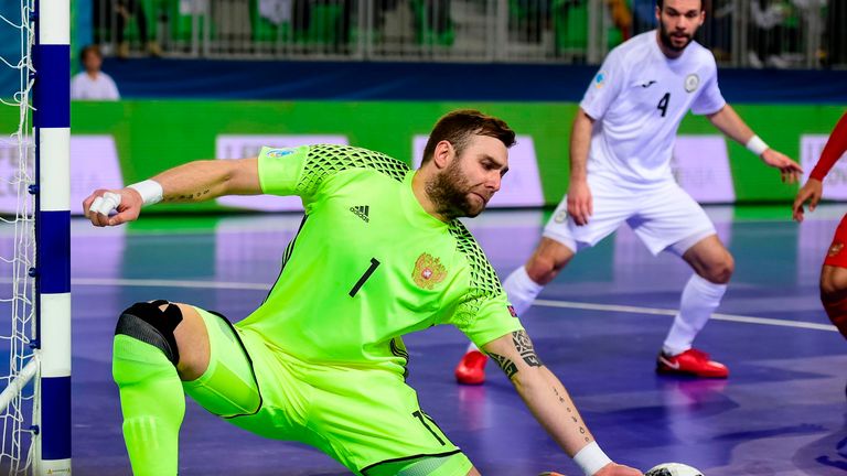 Russia's goalkeeper Georgi Zamtaradze goes for a save during the European Futsal Championship third place playoff match between Russia and Kazakhstan's at Arena Stozice in Ljubljana on February 10, 2018.