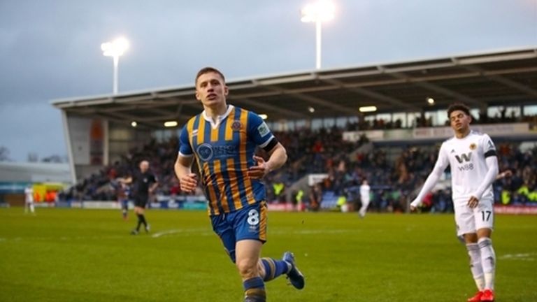 Greg Docherty celebrates scoring Shrewsbury's first goal against Wolves