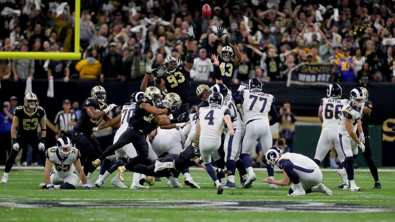Greg Zuerlein of the Los Angeles Rams kicks a field goal to tie the game and send it to overtime against the New Orleans Saints during the fourth quarter in the NFC Championship