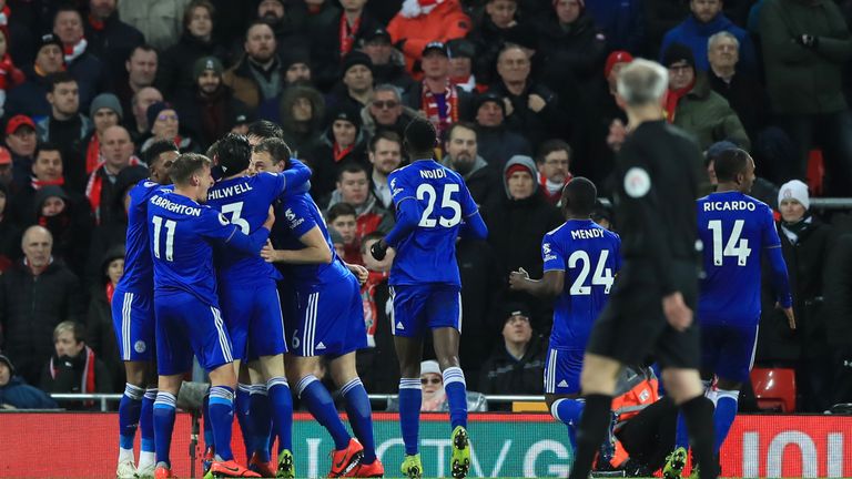 Harry Maguire is mobbed by team-mates after equalising at Anfield