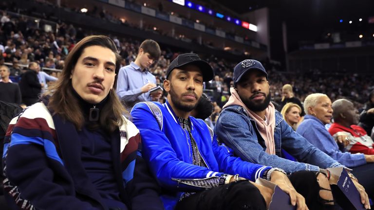 (From left to right) Hector Bellerin, Pierre-Emerick Aubameyang and Alexandre Lacazette in the crowd during the NBA London Game 2019 at the O2 Arena, London