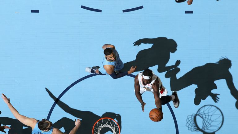 Jrue Holiday of the New Orleans Pelicans shoots a layup during the game against the Memphis Grizzlies