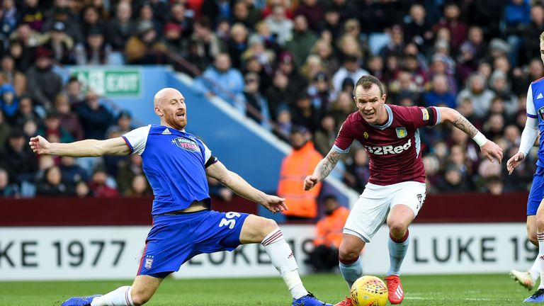 James Collins of Ipswich Town tackles Glenn Whelan  of Aston Villa during the Sky Bet Championship match at the Villa Park, Birmingham. Picture date: 26th January 2019. Picture credit should read: Harry Marshall/Sportimage