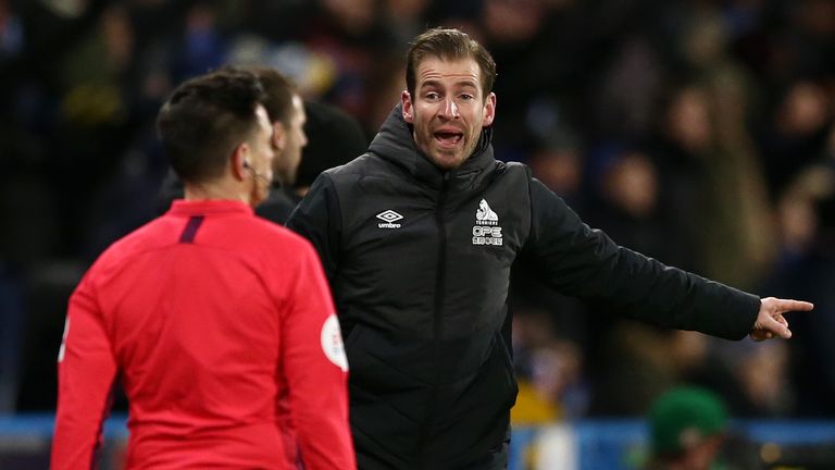 Huddersfield head coach Jan Siewert gestures during his first match in charge