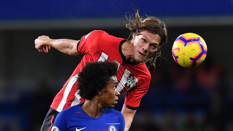 Jannik Vestergaard gets above Willian to head clear