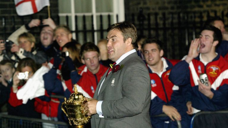 LONDON - DECEMBER 8: England's most capped player Jason Leonard  turn up at Downing Street to meet the Prime Minister Tony Blair with the Rugby World Cup ,December 8, 2003 in London. Up to half a million supporters are expected to flock to central London on Monday for the procession after England beat Australia 20-17 in the final on November 22.  (Photo by Graeme Robertson/Getty Images) *** Local Caption *** England Rugby Team