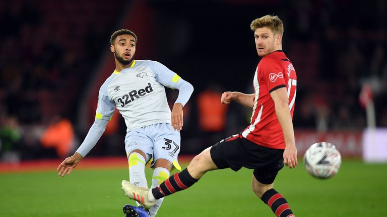 Jayden Bogle of Derby County is challenged by Stuart Armstrong of Southampton