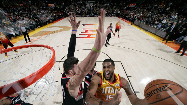Derrick Favors  of the Utah Jazz shoots the ball during the game against the Portland Trail Blazers