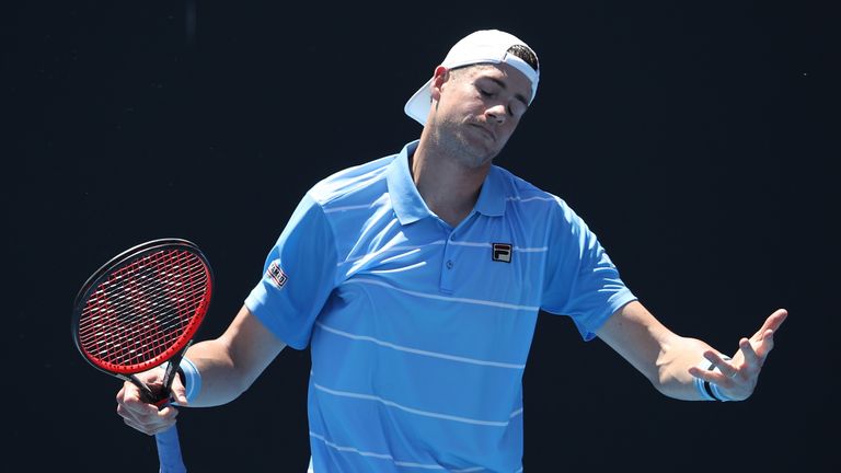 John Isner of the United States reacts in his first round match against Reilly Opelka of the United States during day one of the 2019 Australian Open at Melbourne Park on January 14, 2019 in Melbourne, Australia. 