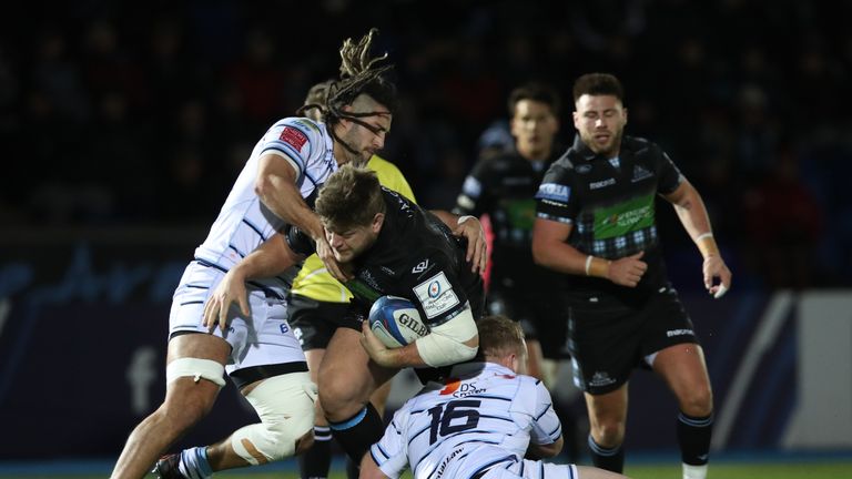 GLASGOW, SCOTLAND - JANUARY 13: Josh Navidi of Cardiff Blues tackles Oli Kebble of Glasgow Warriors during the Champions Cup match between Glasgow Warriors and Cardiff Blues at Scotstoun Stadium on January 13, 2019 in Glasgow, United Kingdom.