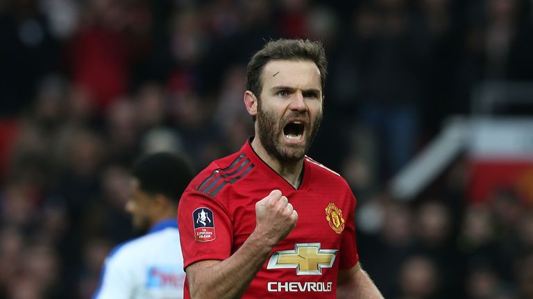 Juan Mata celebrates his penalty