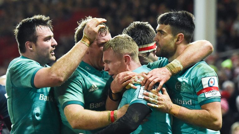 11 January 2019; Keith Earls of Munster, centre, is congratulated by team-mates after scoring his side's third try during the Heineken Champions Cup Pool 2 Round 5 match between Gloucester and Munster at Kingsholm Stadium in Gloucester, England. Photo by Seb Daly/Sportsfile