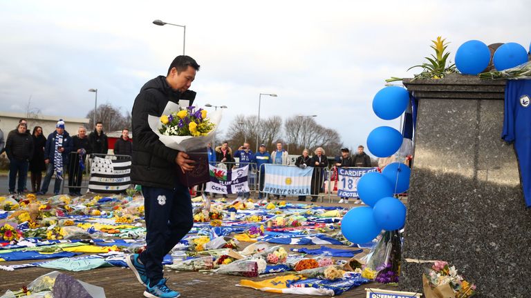 Cardiff chief executive Ken Choo laid flowers outside Cardiff City Stadium on Friday
