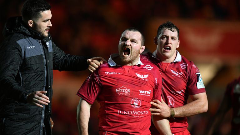 Ken Owens celebrates after scoring Scarlets' second try against Leicester