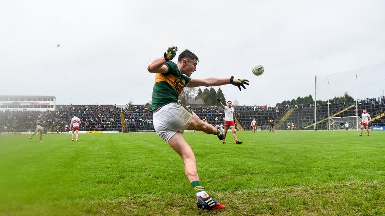 Maurice Fitzgerald-esque: Sean O'Shea of Kerry kicks a point from a sideline against Tyrone